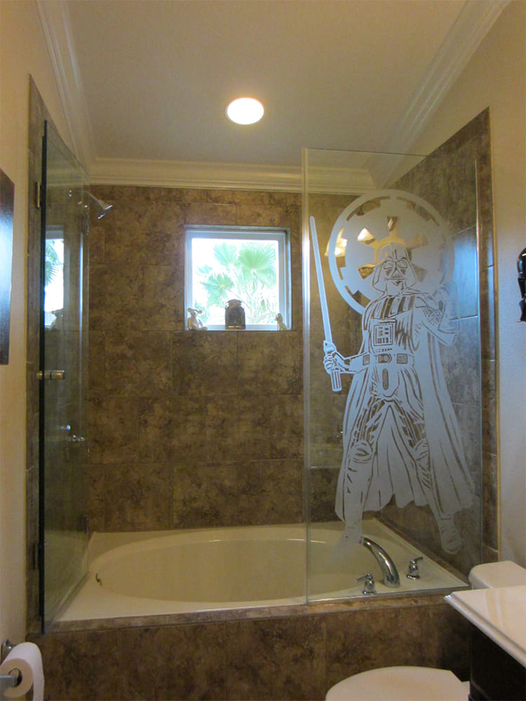 Etched glass shower door example in a bathroom