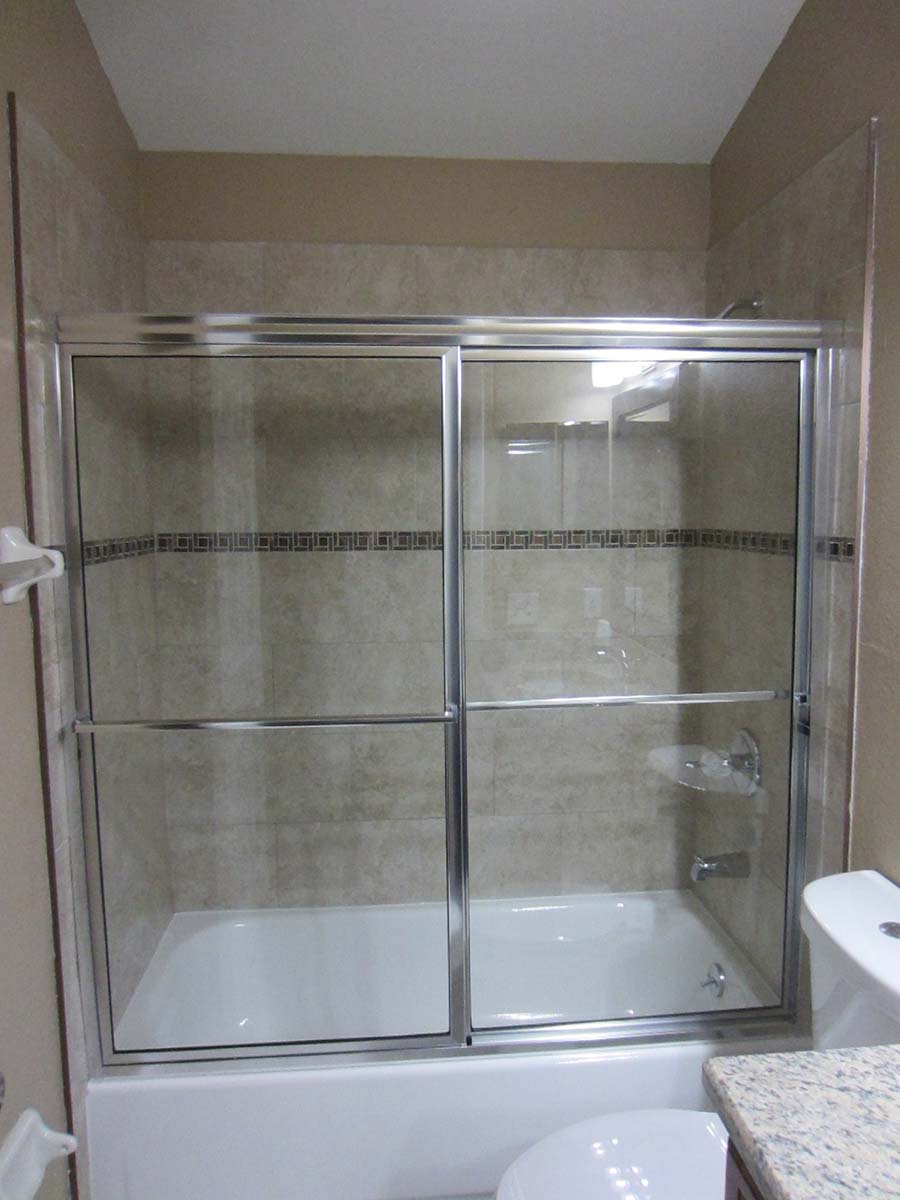 Framed bypass shower door installation