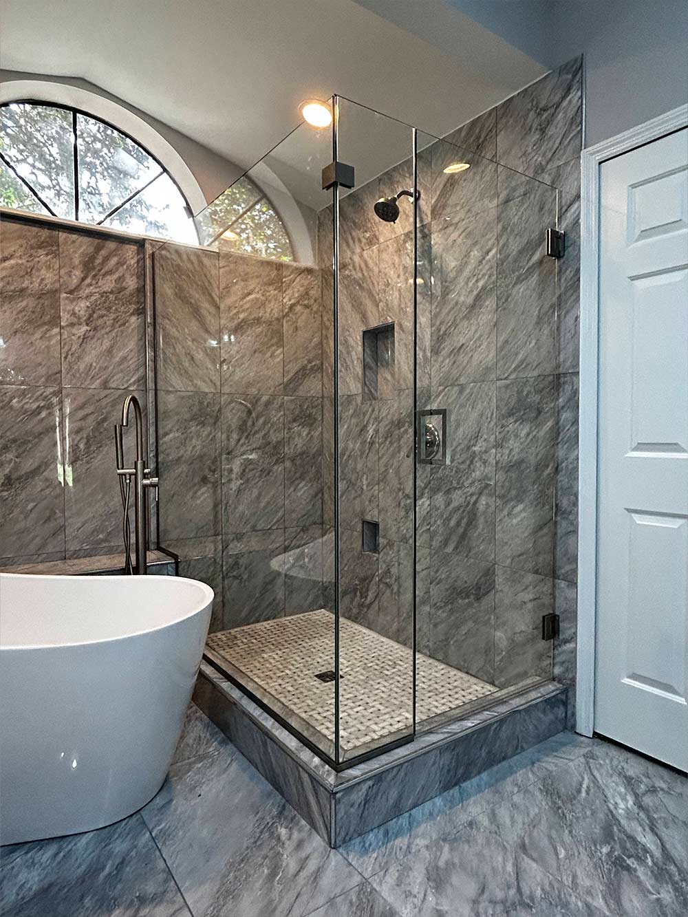 a clean glass shower enclosure