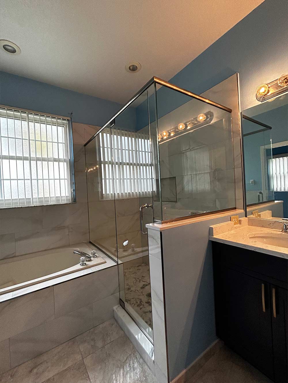 swinging shower door in a bathroom